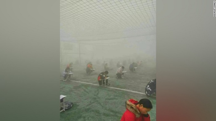 Photos of Chinese students taking test in heavy smog draw outrage